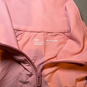 XS full zip light jacket from under armour . Worn 3 times at most. Odor free